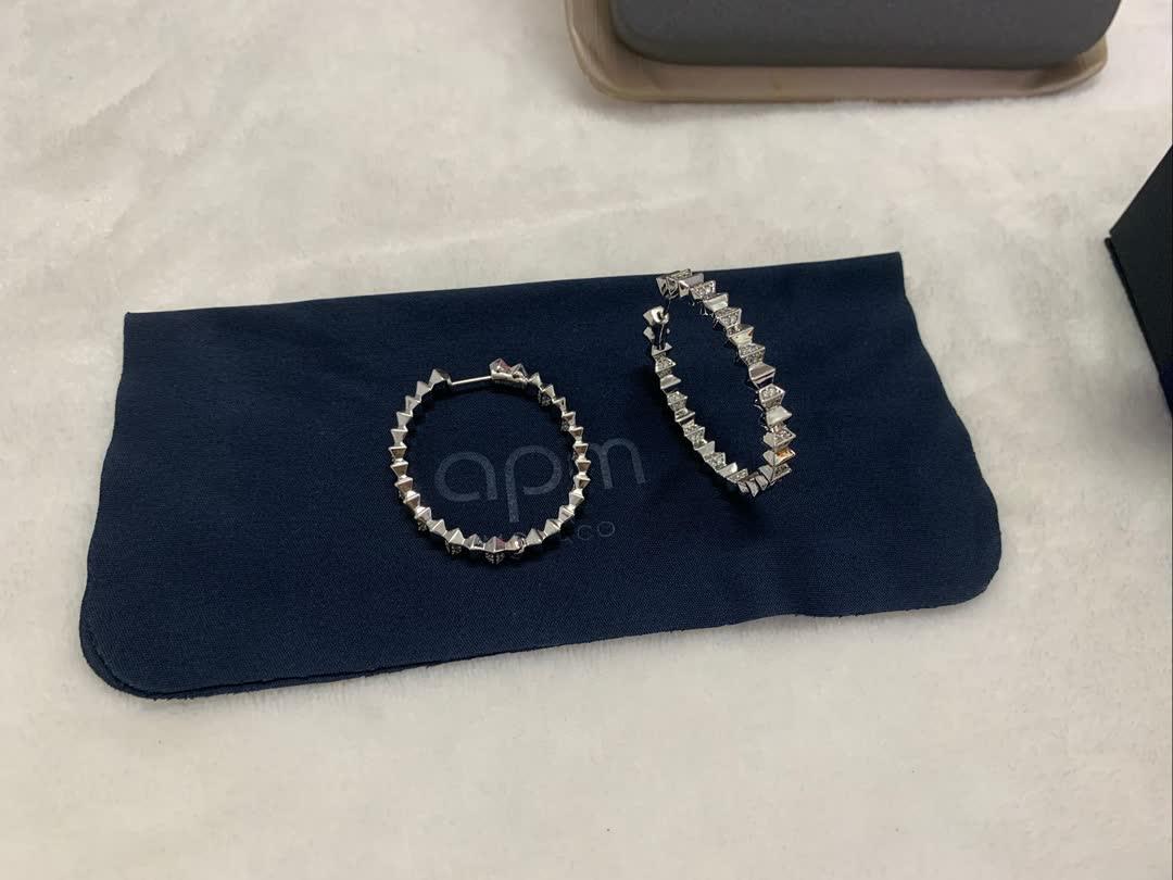 APM Monaco Elegant Silver Hoop Earrings with Diamond Accents